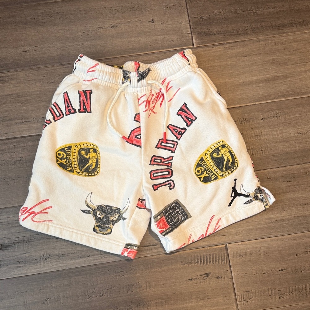 Jordan White Shorts with Red and Black Graphics